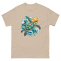 Sand-colored Mellow Moonfish T-shirt with a sea turtle, teal ocean waves and a golden sun