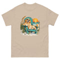Sand-colored Mellow Moonfish T-shirt with a golden retriever in a beach chair beside a coastal sunset