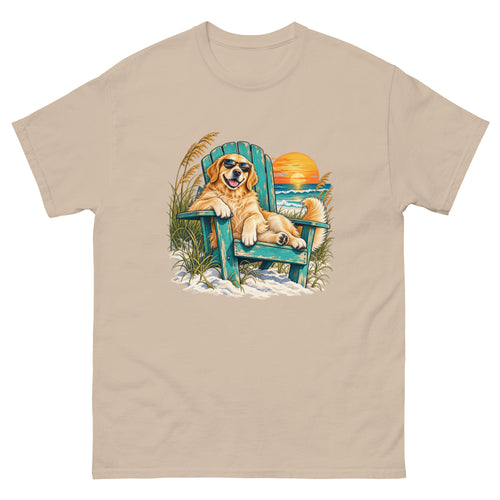 Sand-colored Mellow Moonfish T-shirt with a golden retriever in a beach chair beside a coastal sunset